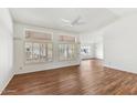 Large living room featuring wood flooring and lots of natural light at 1560 E Riviera Dr, Chandler, AZ 85249