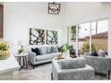 Bright living room with sliding glass doors leading to patio at 4050 N 12Th St # 7, Phoenix, AZ 85014