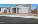 Inviting single-story home with stone veneer, neutral siding, and a well-manicured front yard at 44713 N 44Th Dr, Phoenix, AZ 85087