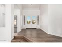 Bright and airy foyer with tile floors and double doors at 16442 N 59Th Pl, Scottsdale, AZ 85254