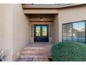 Elegant entryway with double doors and tile flooring at 16442 N 59Th Pl, Scottsdale, AZ 85254