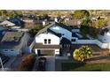 Aerial view of a house with a pool in a residential neighborhood at 8050 E Tuckey Ln, Scottsdale, AZ 85250