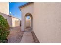 Side view of house showing pathway and landscaping at 7313 N 69Th Ave, Glendale, AZ 85303