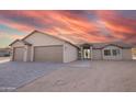 Modern home with a two-car garage and neutral color palette at 35852 N 10Th St, Phoenix, AZ 85086