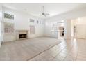 Bright living room featuring a fireplace with views through to the kitchen at 11260 N 92Nd St # 1080, Scottsdale, AZ 85260