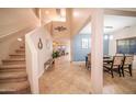 Bright and airy entryway with a staircase leading to the upper level at 23914 N 25Th Way, Phoenix, AZ 85024