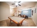 Spacious game room featuring a pool table and an open floor plan at 23914 N 25Th Way, Phoenix, AZ 85024