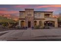 Stunning two-story house with stone facade and landscaped yard at 2322 E Samantha Way, Phoenix, AZ 85042