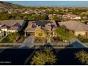 Single story home with solar panels and a large backyard at 20964 W Hillcrest Blvd, Buckeye, AZ 85396