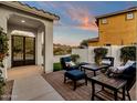 Relaxing patio with seating area, artificial turf, and mountain views at 17408 N 96Th Way, Scottsdale, AZ 85255