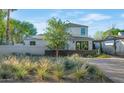 Contemporary home with a landscaped front yard and driveway at 221 E 14Th St, Tempe, AZ 85281