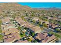 Community overview featuring a large house with a pool at 27486 N 89Th Dr, Peoria, AZ 85383