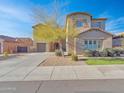 Stunning two-story home with manicured lawn at 27486 N 89Th Dr, Peoria, AZ 85383