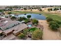 Stunning property with pool, golf course & lake views at 1950 N 142Nd Ave, Goodyear, AZ 85395