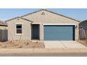 Inviting single-story home with a blue garage door and tidy front yard at 3390 E Audrey Dr, San Tan Valley, AZ 85143
