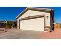 Two-car garage with a clean and modern look at 22538 W Mohave St, Buckeye, AZ 85326