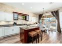 Spacious kitchen with granite countertops and island at 2257 W Periwinkle Way, Chandler, AZ 85248