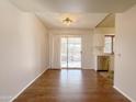 Spacious dining area with sliding glass doors leading to patio at 9457 W Newport Dr, Sun City, AZ 85351