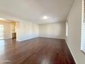 Bright living room featuring hardwood floors and large windows at 9457 W Newport Dr, Sun City, AZ 85351