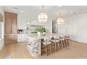 Bright kitchen featuring a large island and modern cabinetry at 2090 E Coconino Ct, Gilbert, AZ 85298