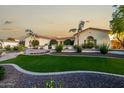 Beautiful home with a landscaped front yard and walkway at 4547 S Banning Dr, Gilbert, AZ 85297