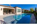 Inviting rectangular pool with a large patio area at 97 E Alcatara Ave, San Tan Valley, AZ 85140