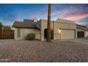 Cute one-story house with a single-car garage and desert landscaping at 1337 N Rosemont --, Mesa, AZ 85205