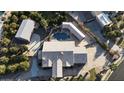 Top-down view of a house with a pool and detached garage at 3835 E Leland St, Mesa, AZ 85215