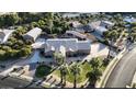 Luxury home with pool, large yard, and detached garage, seen from above at 3835 E Leland St, Mesa, AZ 85215