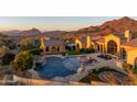 Luxury estate with pool, expansive grounds, and scenic mountain views at 4308 N Sage Creek Cir, Mesa, AZ 85207