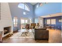 Spacious living room featuring a fireplace and high ceilings at 13227 N Mimosa Dr # 109, Fountain Hills, AZ 85268