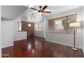 Spacious living room featuring hardwood floors and a ceiling fan at 3302 N 7Th St # 226, Phoenix, AZ 85014