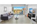 Spacious living room with floor to ceiling windows and city views at 805 N 4Th Ave # 609, Phoenix, AZ 85003