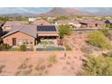 Home features solar panels, pool, and expansive desert views at 6217 E Sienna Bouquet Pl, Cave Creek, AZ 85331