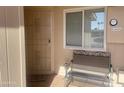 Inviting front porch with metal security door and seating at 11012 W Thunderbird W Blvd, Sun City, AZ 85351