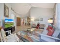 Open living area with hardwood floors and access to patio at 23635 N 75Th Pl, Scottsdale, AZ 85255
