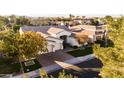 Luxury property featuring a spacious yard and desirable curb appeal at 4516 S Jojoba Way, Chandler, AZ 85248