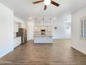 The open-concept living space features tile floors and abundant natural light at 10559 E Simone Ave, Mesa, AZ 85212