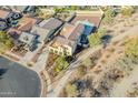 A high-angle shot shows the property, highlighting the backyard space and a neighboring home at 4510 N Pierce Ct, Buckeye, AZ 85396