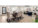 Open dining area with seating for four and wood floors at 6056 E Harvard St, Scottsdale, AZ 85257