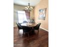 Elegant dining room with hardwood floors and a chandelier at 5431 E Shea Blvd, Scottsdale, AZ 85254