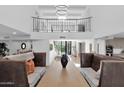 Elegant dining room with a high ceiling and stylish decor at 6701 N Scottsdale Rd # 24, Scottsdale, AZ 85250