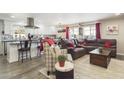 Open floor plan with modern kitchen and comfortable living room at 2600 E Allred Ave # R87, Mesa, AZ 85204