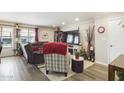 Bright living room featuring hardwood floors and cozy seating at 2600 E Allred Ave # R87, Mesa, AZ 85204