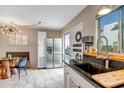 View of the kitchen featuring stainless steel appliances and breakfast area at 4600 N 68Th St # 313, Scottsdale, AZ 85251