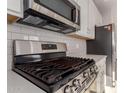 Stainless steel gas range with griddle at 21615 N Daniel Dr, Maricopa, AZ 85138