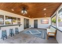Covered patio with seating area and access to the backyard at 2804 W Curry St, Chandler, AZ 85224