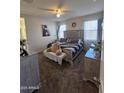 Spacious Primary bedroom with large bed and plenty of natural light at 44394 W Palo Aliso Way, Maricopa, AZ 85138