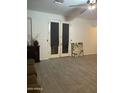 Bright living room featuring tile floors and french doors leading to outdoor area at 15 W Mill Reef Dr, San Tan Valley, AZ 85143