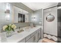 Modern bathroom with stylish tile and double vanity at 1028 W Indian Hills Pl, Phoenix, AZ 85023